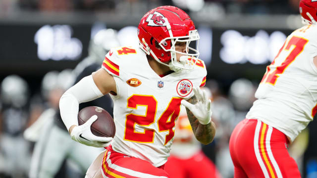 Nov 26, 2023; Paradise, Nevada, USA; Kansas City Chiefs wide receiver Skyy Moore (24) gains yardage against the Las Vegas Raiders during the first quarter at Allegiant Stadium. Mandatory Credit: Stephen R. Sylvanie-USA TODAY Sports  